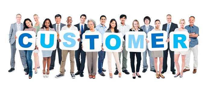 A group of People holding letters that spell Customer