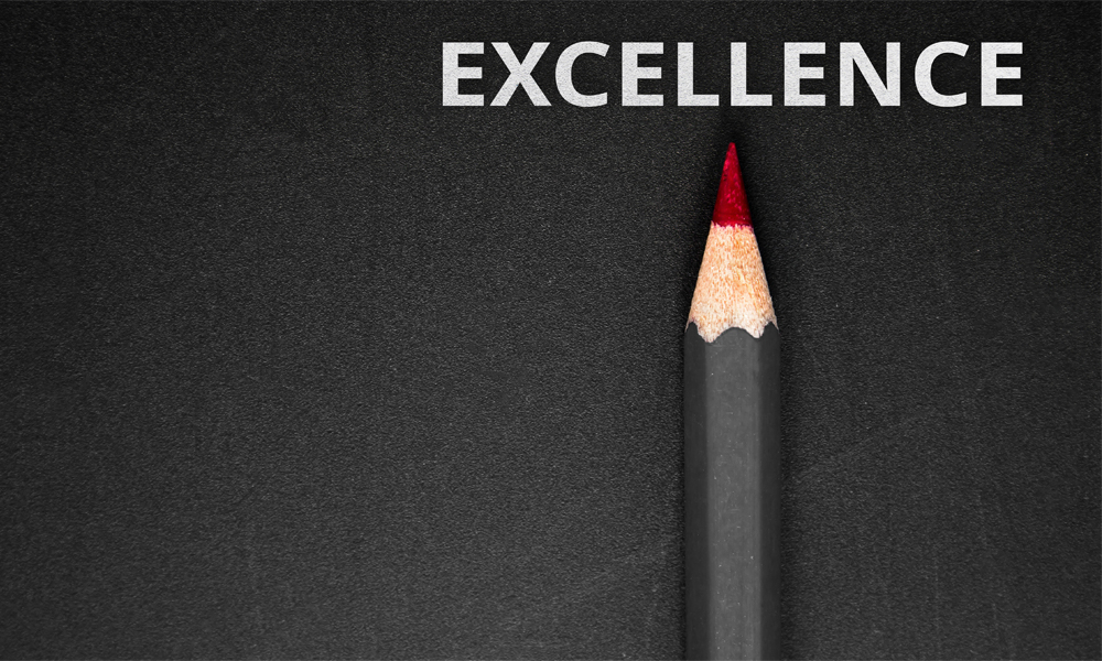 Black pencil with red lead representing Operational Excellence